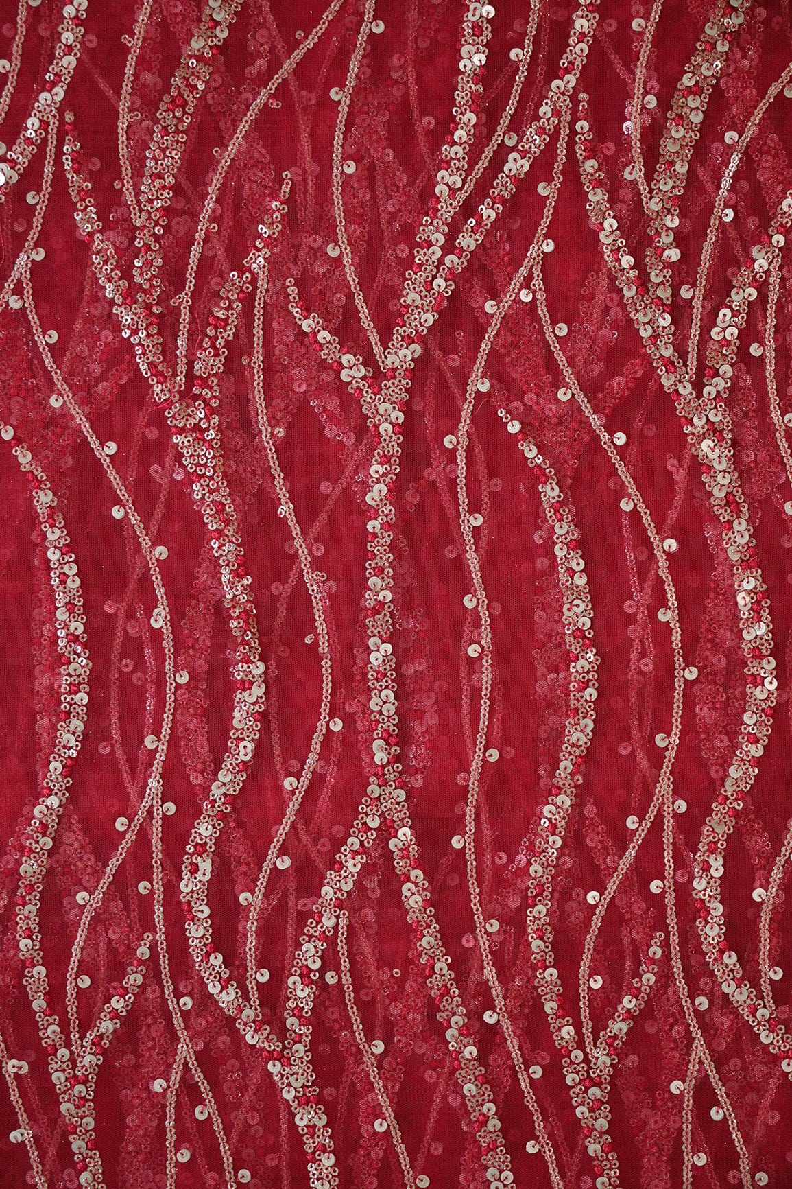 AIzaSyBcstauz-XMPRhEY21AUzeo032pxrXB5Ug - Gold And Silver Sequins With Red Thread Wavy Embroidery Work On Cherry Red Soft Net Fabric