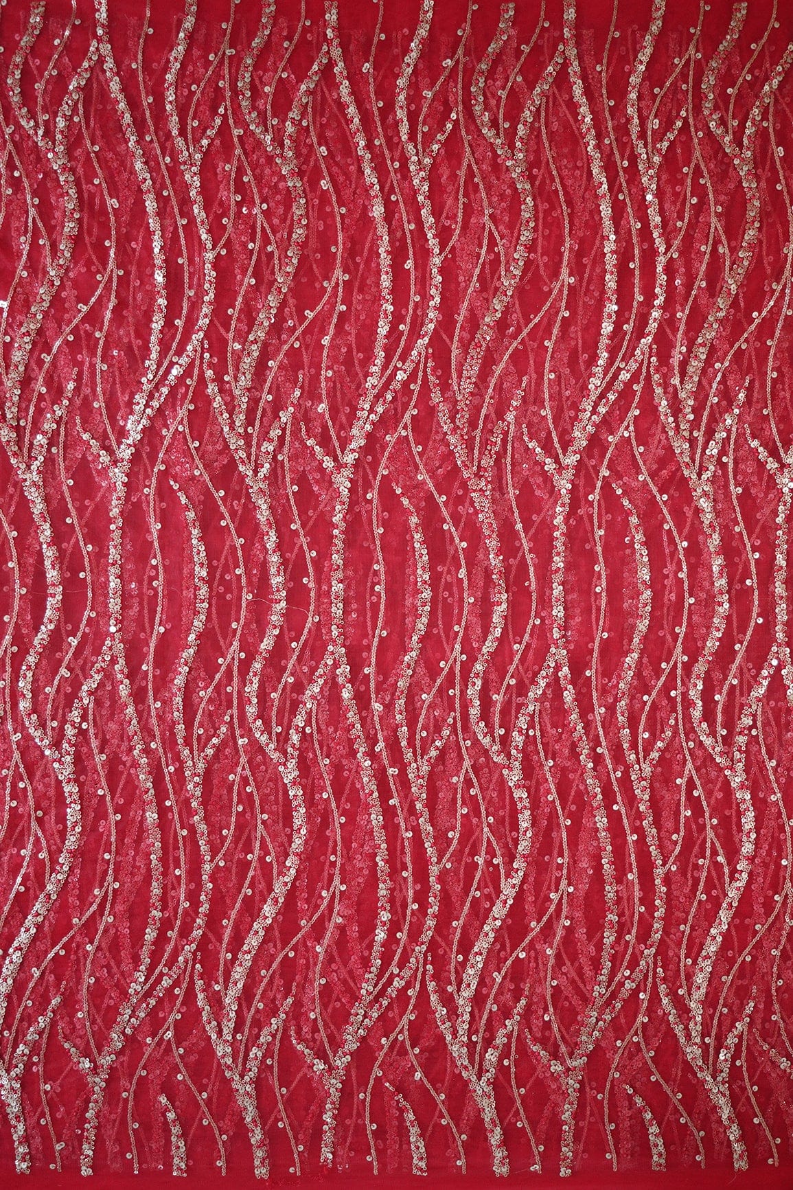 AIzaSyBcstauz-XMPRhEY21AUzeo032pxrXB5Ug - Gold And Silver Sequins With Red Thread Wavy Embroidery Work On Cherry Red Soft Net Fabric