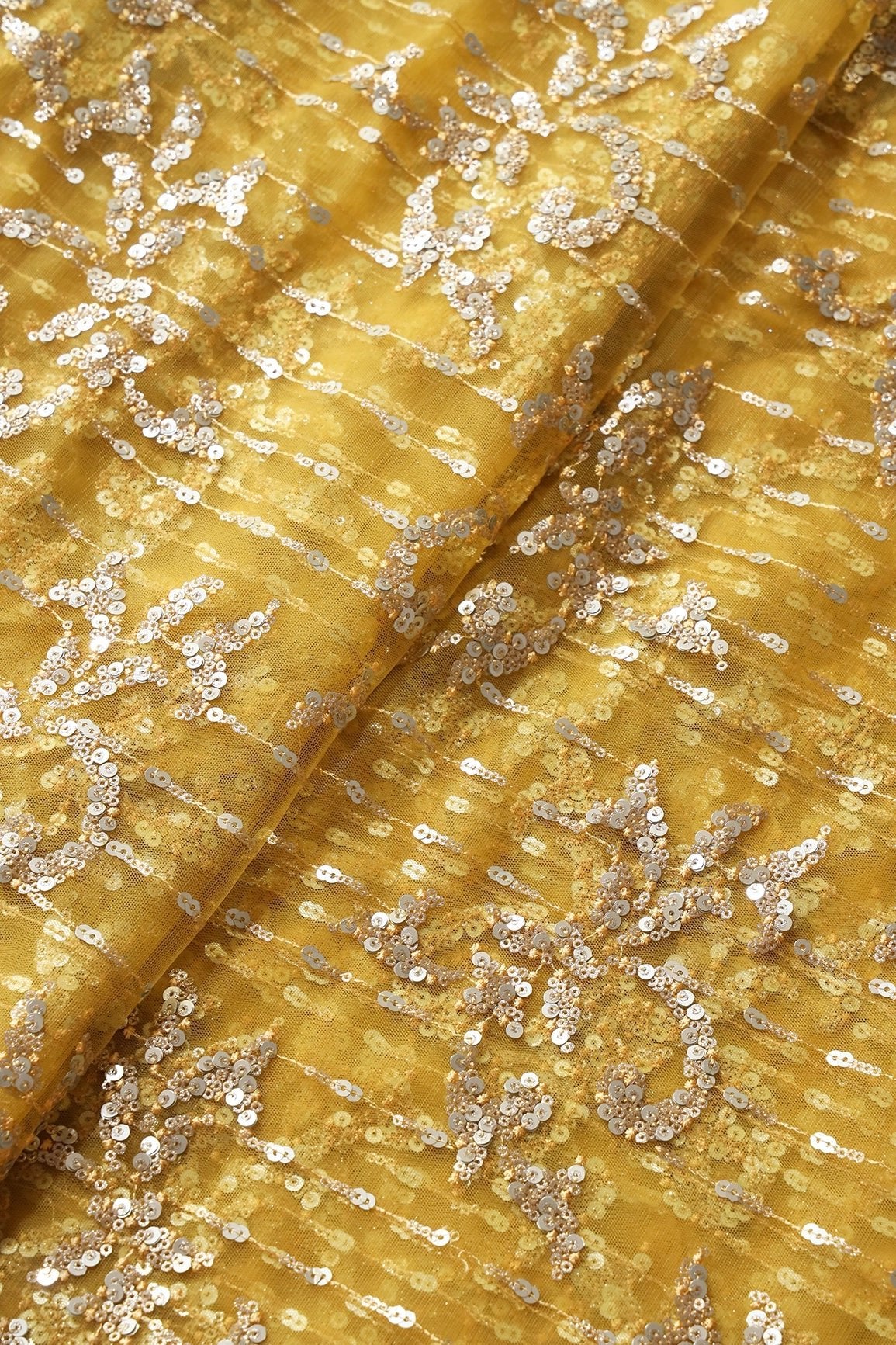 AIzaSyBcstauz-XMPRhEY21AUzeo032pxrXB5Ug - Gold And Silver Sequins With Yellow Thread Abstract Embroidery Work On Yellow Soft Net Fabric