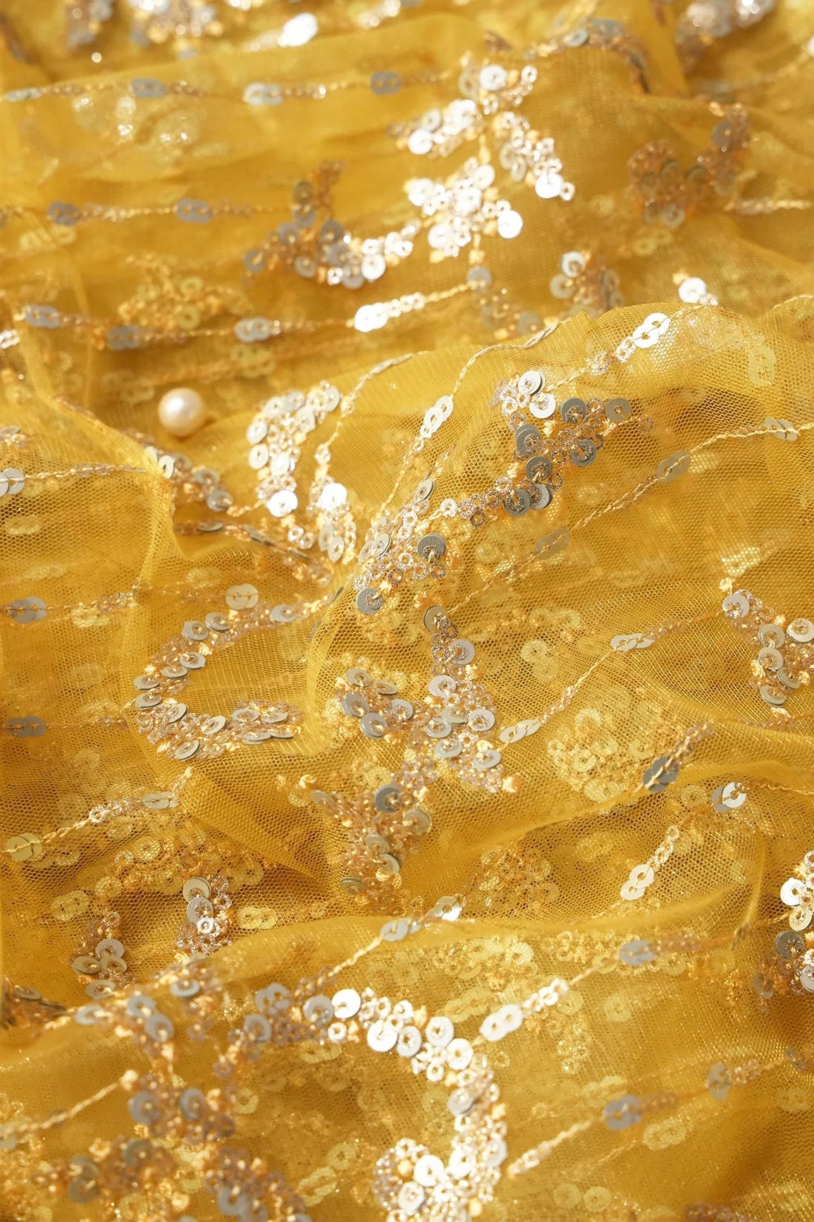 AIzaSyBcstauz-XMPRhEY21AUzeo032pxrXB5Ug - Gold And Silver Sequins With Yellow Thread Abstract Embroidery Work On Yellow Soft Net Fabric