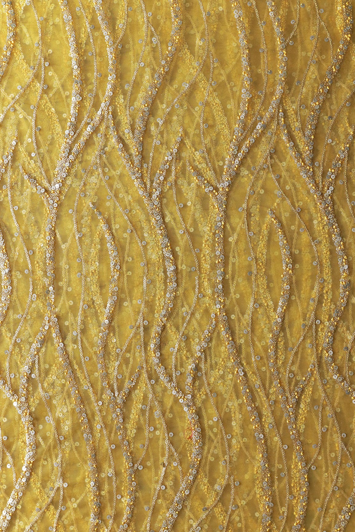 AIzaSyBcstauz-XMPRhEY21AUzeo032pxrXB5Ug - Gold And Silver Sequins With yellow Thread Wavy Embroidery Work On yellow Soft Net Fabric