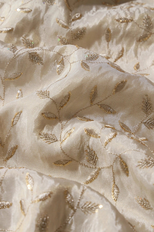 AIzaSyBcstauz-XMPRhEY21AUzeo032pxrXB5Ug - Gold Sequins And Zari Leafy Embroidery Work On Dyeable Pure Viscose Zari Tissue Fabric