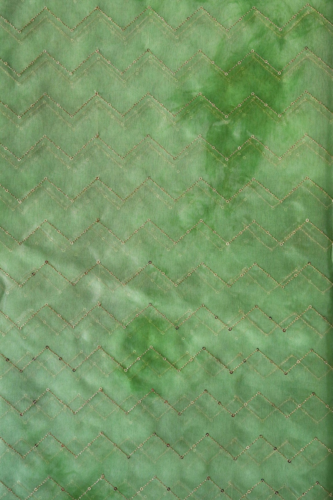AIzaSyBcstauz-XMPRhEY21AUzeo032pxrXB5Ug - Gold Sequins Chevron Embroidery Work On Tie & Dye Olive Organza Fabric