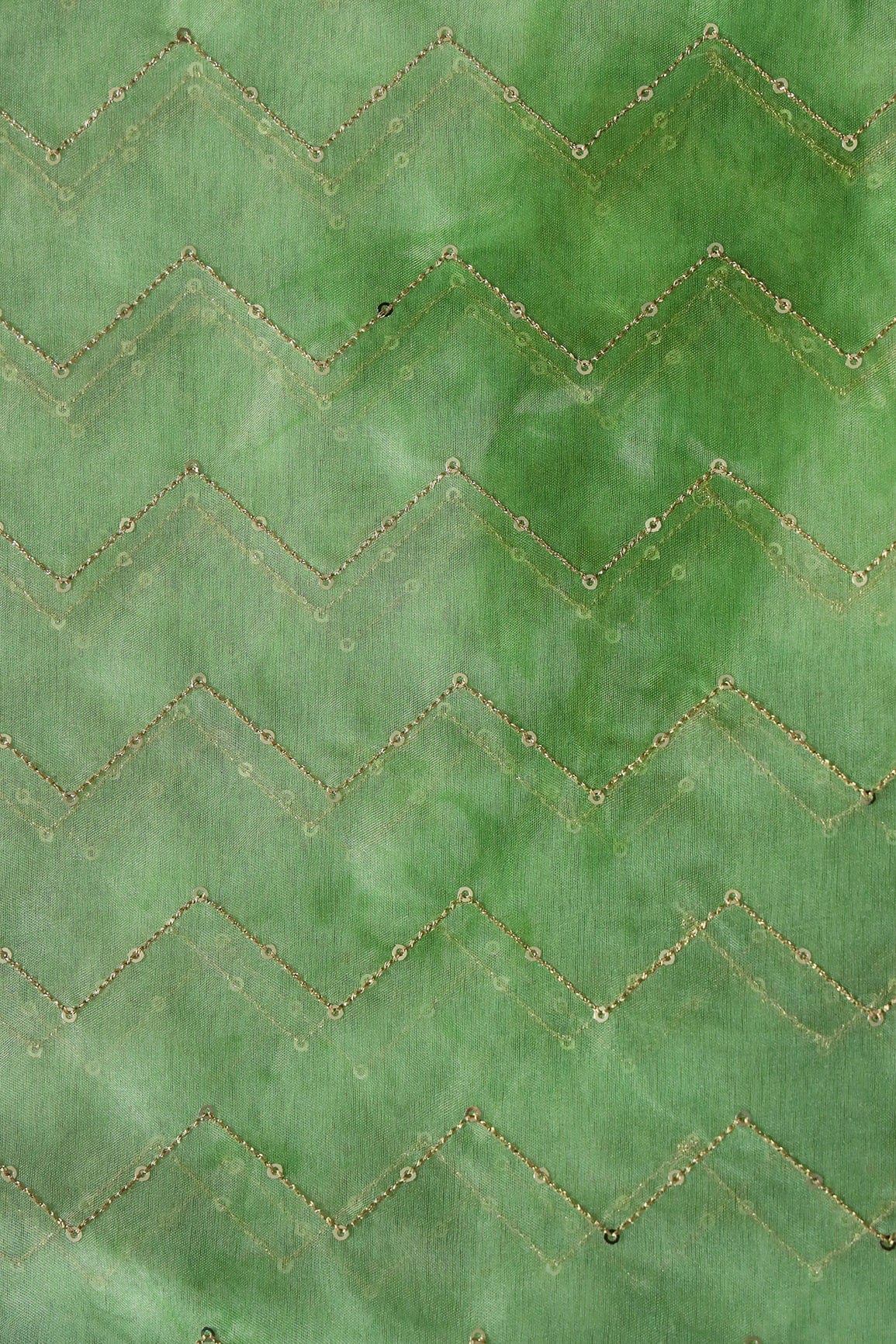 AIzaSyBcstauz-XMPRhEY21AUzeo032pxrXB5Ug - Gold Sequins Chevron Embroidery Work On Tie & Dye Olive Organza Fabric