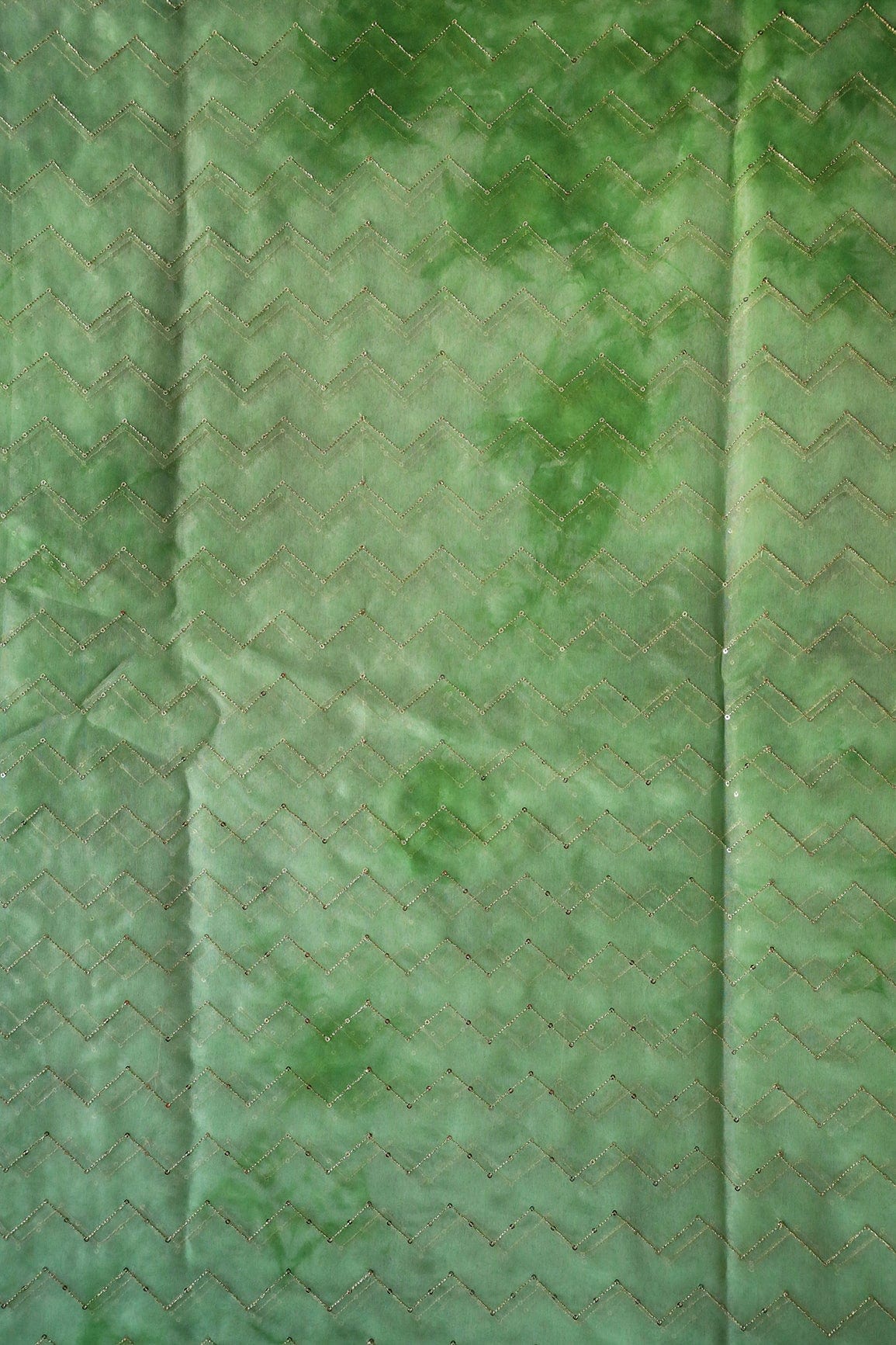 AIzaSyBcstauz-XMPRhEY21AUzeo032pxrXB5Ug - Gold Sequins Chevron Embroidery Work On Tie & Dye Olive Organza Fabric