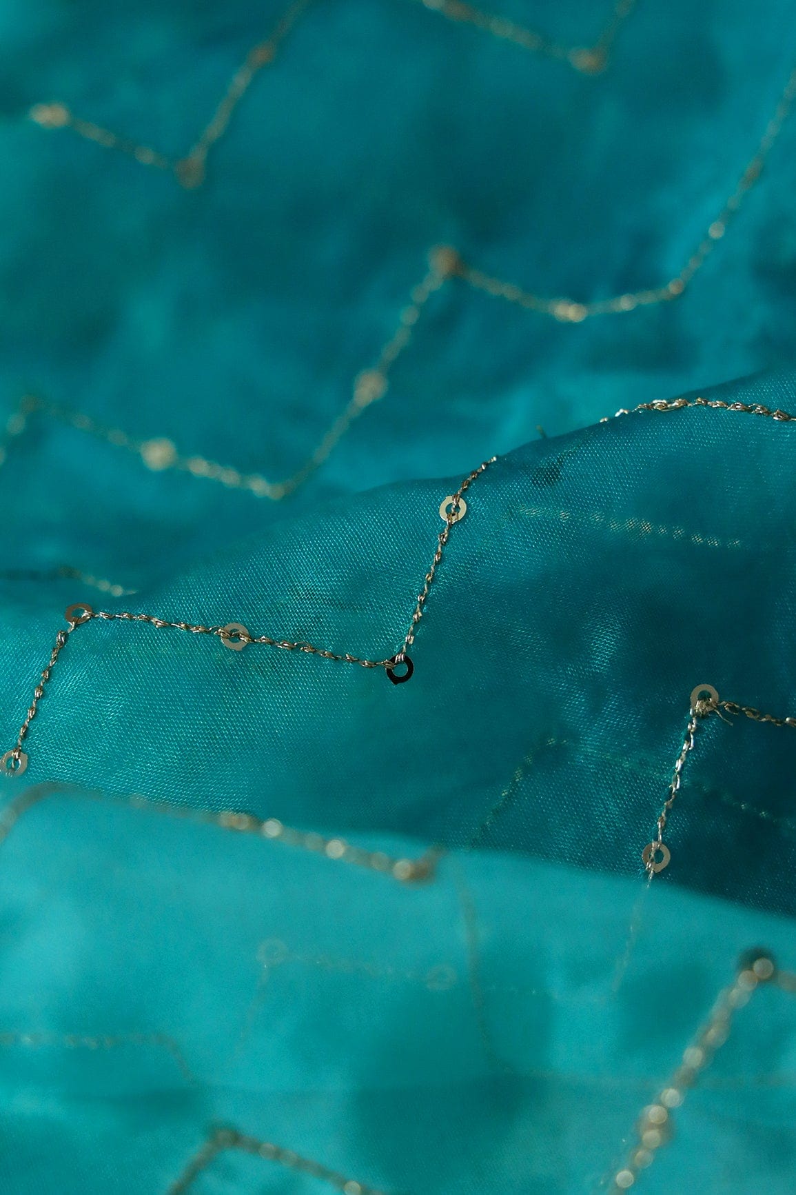 AIzaSyBcstauz-XMPRhEY21AUzeo032pxrXB5Ug - Gold Sequins Chevron Embroidery Work On Tie & Dye Rama Organza Fabric