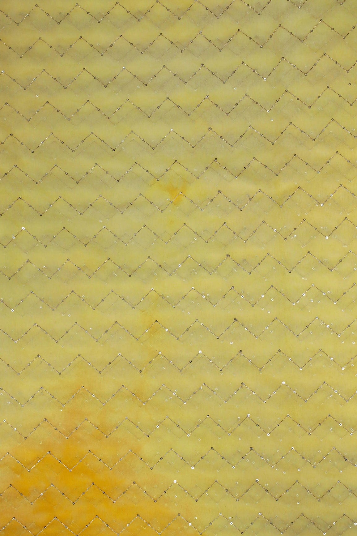 AIzaSyBcstauz-XMPRhEY21AUzeo032pxrXB5Ug - Gold Sequins Chevron Embroidery Work On Tie & Dye Yellow Organza Fabric