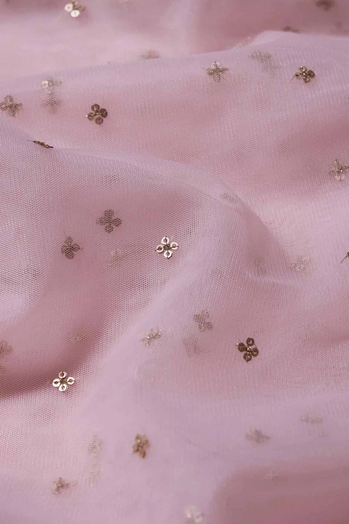 AIzaSyBcstauz-XMPRhEY21AUzeo032pxrXB5Ug - Gold Sequins Small Motif Embroidery Work On Baby Pink Soft Net Fabric