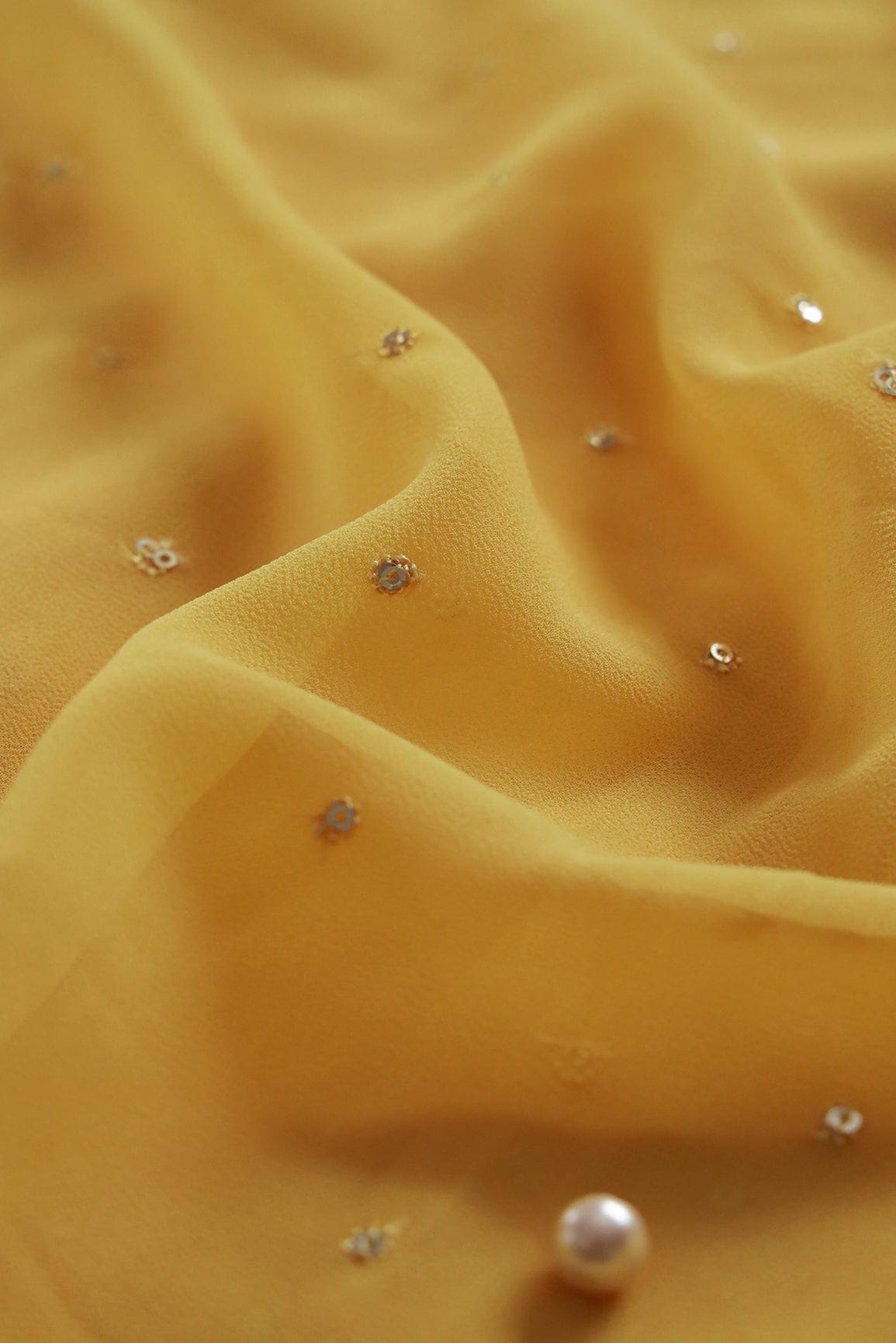 AIzaSyBcstauz-XMPRhEY21AUzeo032pxrXB5Ug - Gold Sequins Small Motif Embroidery Work On Yellow Georgette Fabric