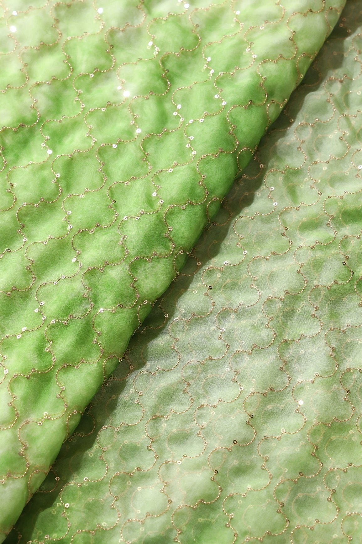 AIzaSyBcstauz-XMPRhEY21AUzeo032pxrXB5Ug - Gold Sequins With Gold Zari Ogee Embroidery Work On Tie & Dye Parrot Green Organza Fabric