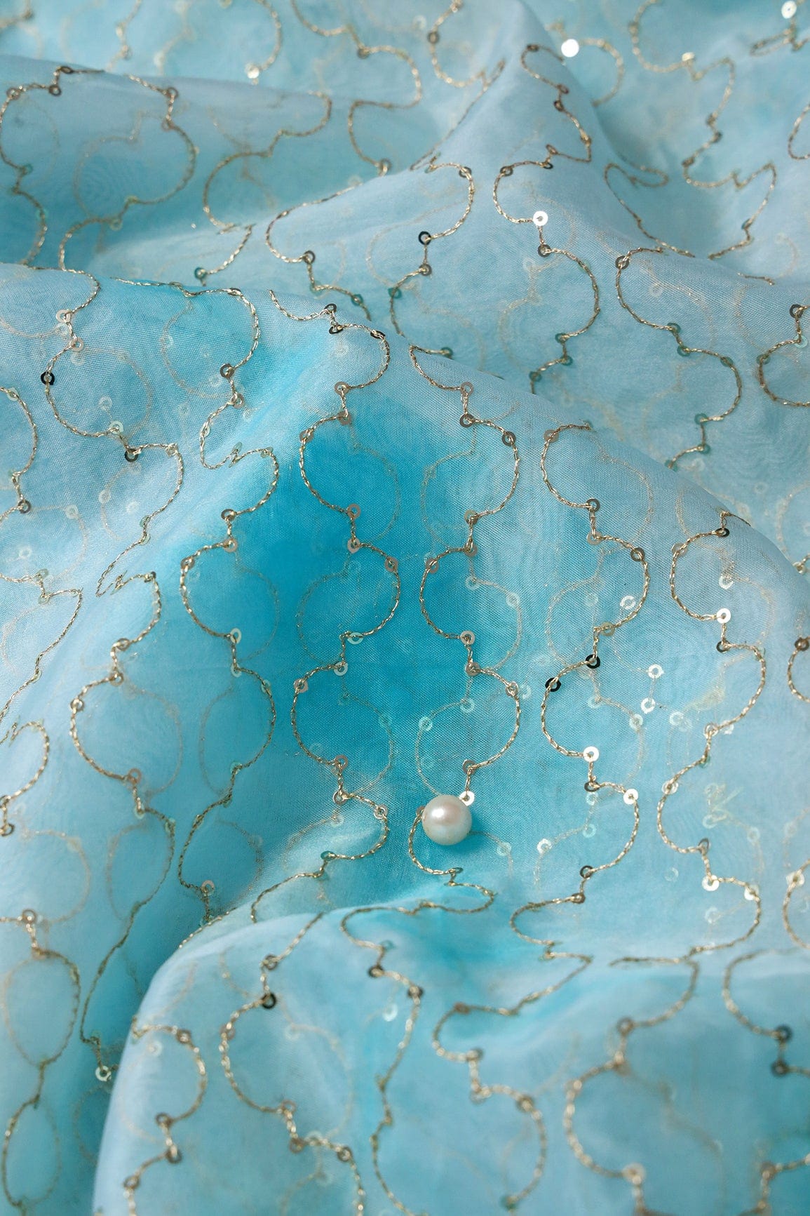 AIzaSyBcstauz-XMPRhEY21AUzeo032pxrXB5Ug - Gold Sequins With Gold Zari Ogee Embroidery Work On Tie & Dye Sky Blue Organza Fabric