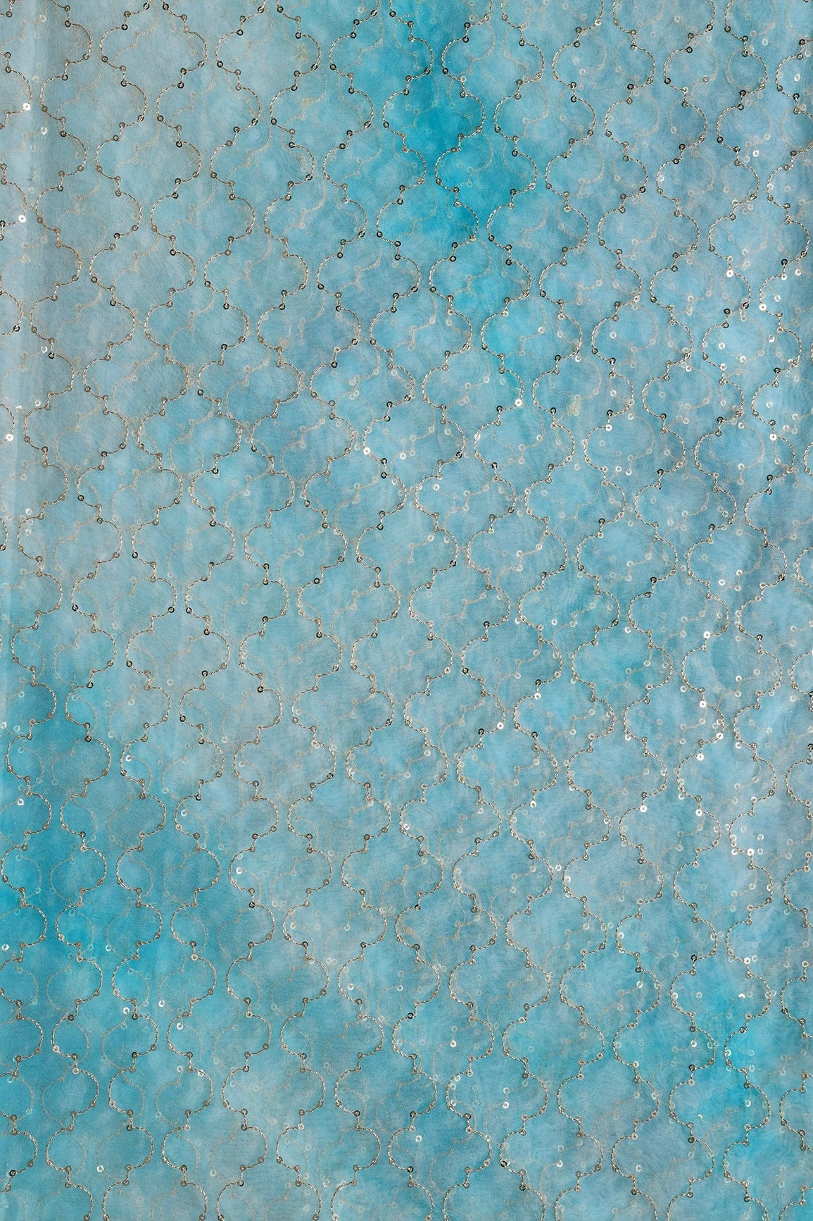 AIzaSyBcstauz-XMPRhEY21AUzeo032pxrXB5Ug - Gold Sequins With Gold Zari Ogee Embroidery Work On Tie & Dye Sky Blue Organza Fabric