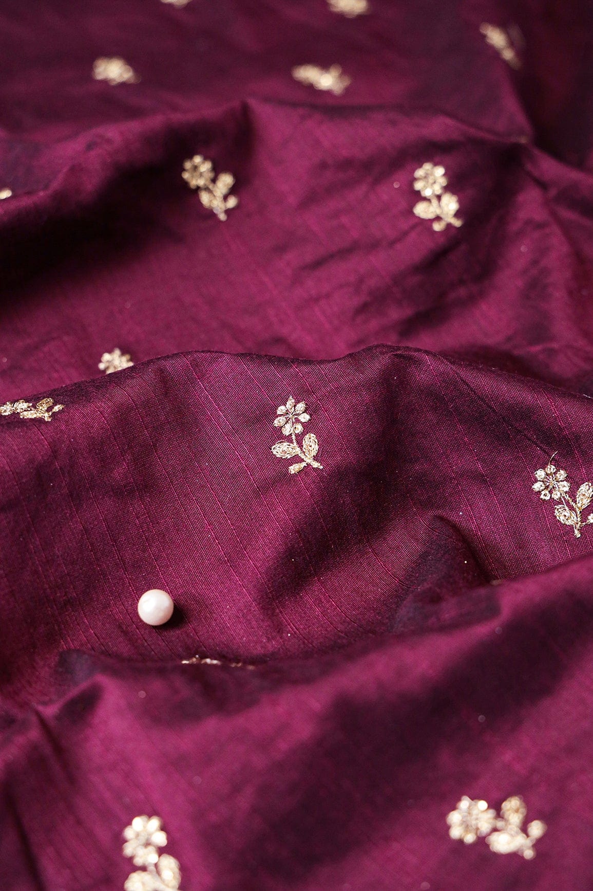 AIzaSyBcstauz-XMPRhEY21AUzeo032pxrXB5Ug - Gold Sequins With Gold Zari Small Floral Motif Embroidery Work On Wine Raw Silk Fabric