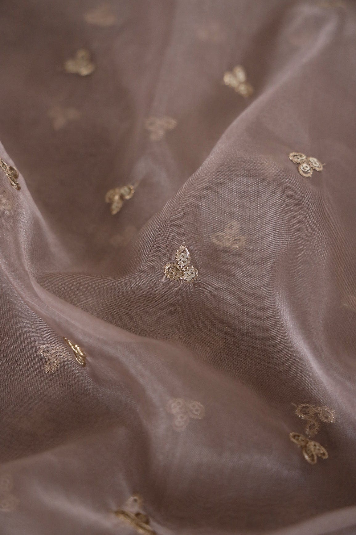 AIzaSyBcstauz-XMPRhEY21AUzeo032pxrXB5Ug - Gold Sequins With Gold Zari Small Leafy Motif Embroidery Work On Brown Organza Fabric