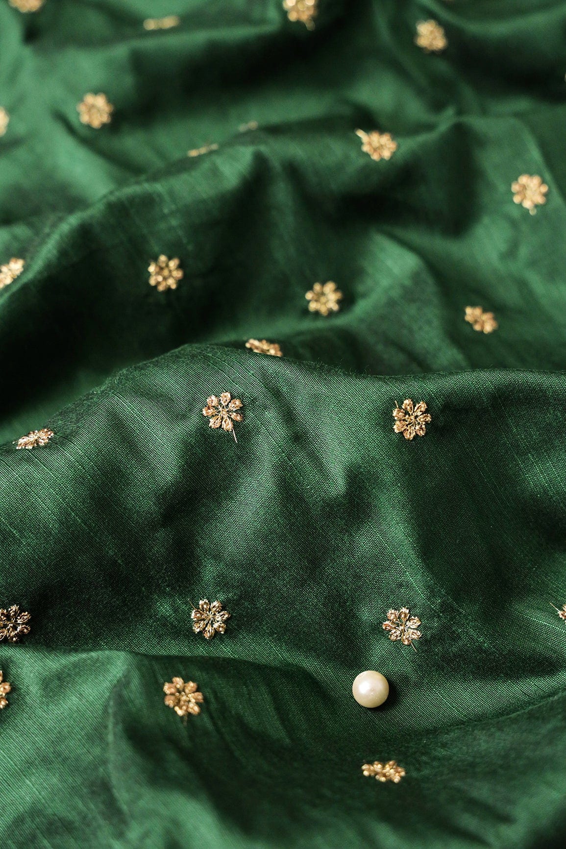 AIzaSyBcstauz-XMPRhEY21AUzeo032pxrXB5Ug - Gold Sequins With Gold Zari Small Motif Embroidery Work On Bottle Green Raw Silk Fabric