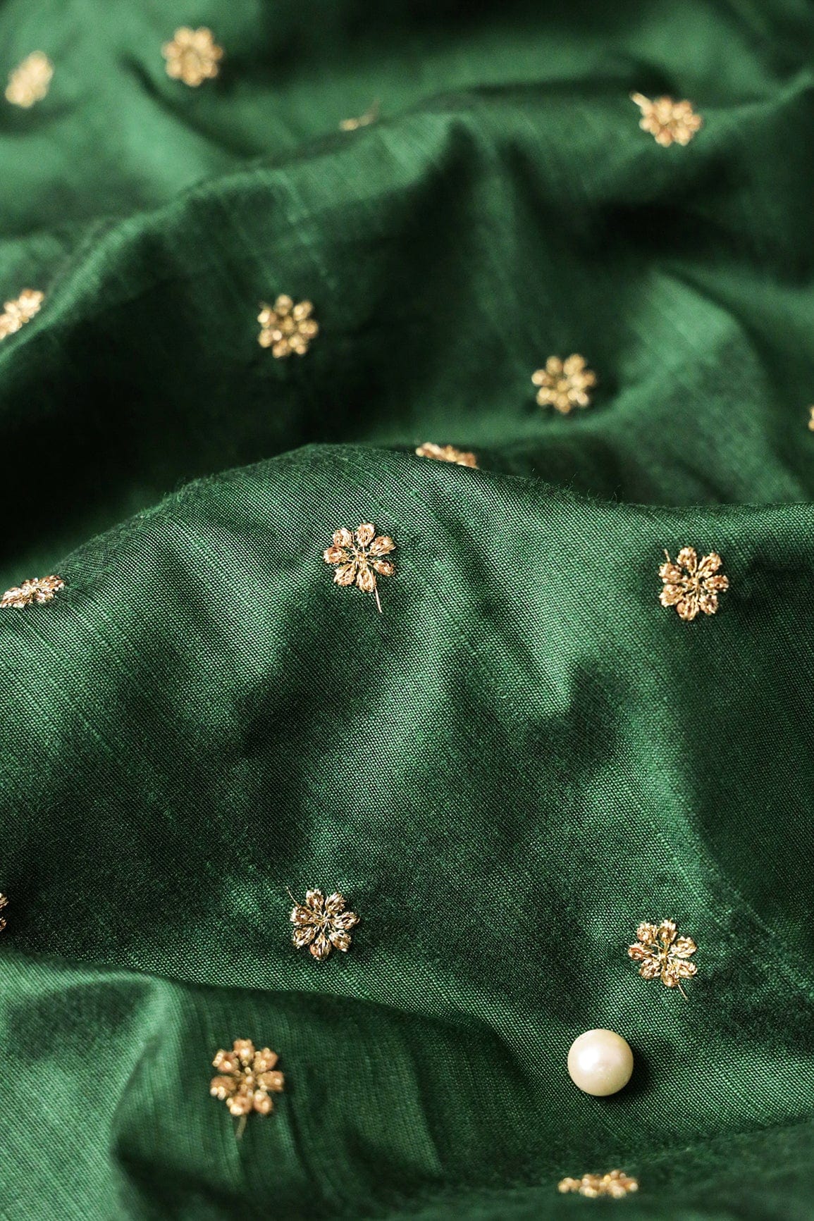 AIzaSyBcstauz-XMPRhEY21AUzeo032pxrXB5Ug - Gold Sequins With Gold Zari Small Motif Embroidery Work On Bottle Green Raw Silk Fabric