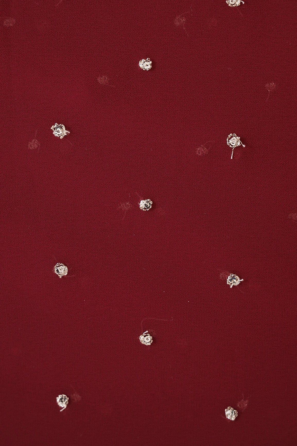 AIzaSyBcstauz-XMPRhEY21AUzeo032pxrXB5Ug - Gold Sequins With Gold Zari Small Motif Embroidery Work On Dark Maroon Georgette Fabric