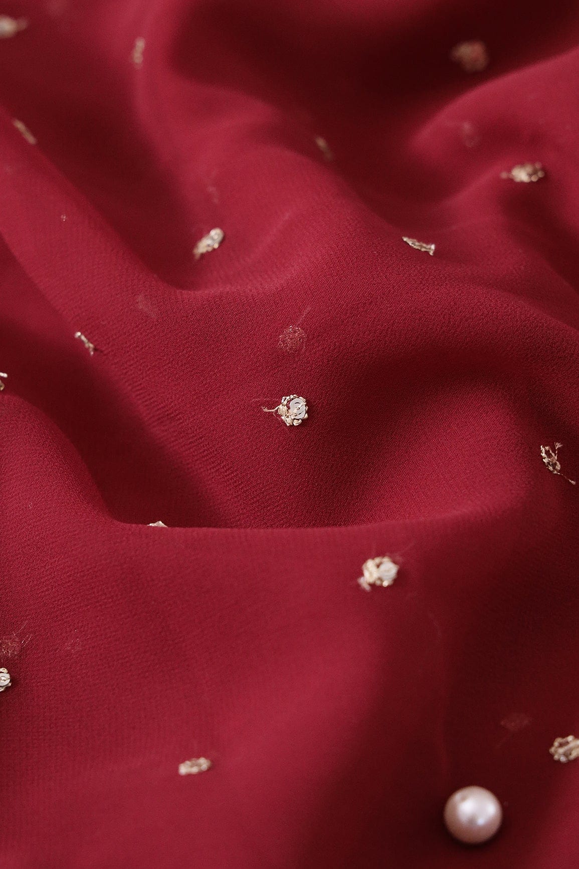 AIzaSyBcstauz-XMPRhEY21AUzeo032pxrXB5Ug - Gold Sequins With Gold Zari Small Motif Embroidery Work On Dark Maroon Georgette Fabric