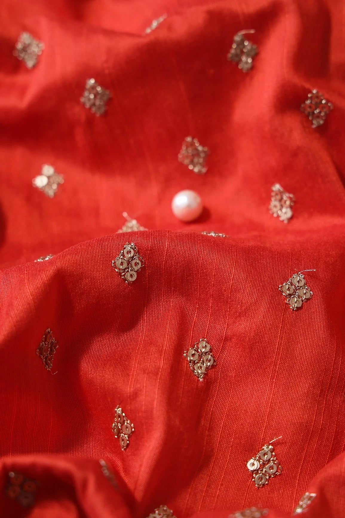 AIzaSyBcstauz-XMPRhEY21AUzeo032pxrXB5Ug - Gold Sequins With Gold Zari Small Motif Embroidery Work On Orange Raw Silk Fabric