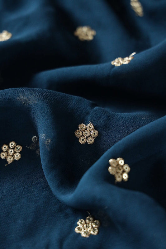 AIzaSyBcstauz-XMPRhEY21AUzeo032pxrXB5Ug - Gold Sequins With Gold Zari Small Motif Embroidery Work On Prussian Blue Georgette Fabric