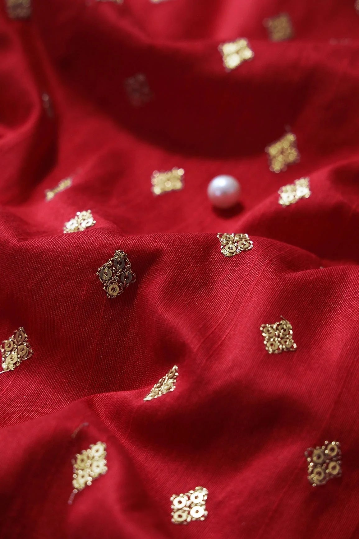 AIzaSyBcstauz-XMPRhEY21AUzeo032pxrXB5Ug - Gold Sequins With Gold Zari Small Motif Embroidery Work On Red Raw Silk Fabric