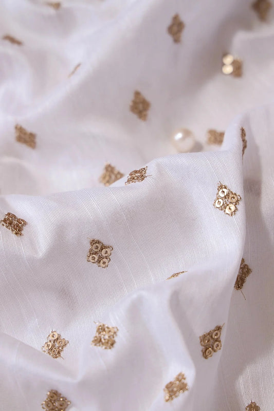 AIzaSyBcstauz-XMPRhEY21AUzeo032pxrXB5Ug - Gold Sequins With Gold Zari Small Motif Embroidery Work On White Raw Silk Fabric
