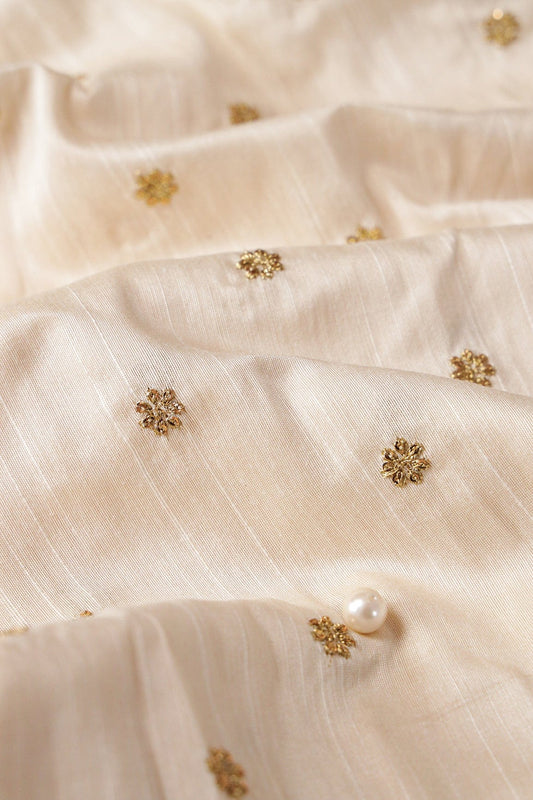AIzaSyBcstauz-XMPRhEY21AUzeo032pxrXB5Ug - Gold Sequins With Gold Zari Small Motif Embroidery Work On White Raw Silk Fabric