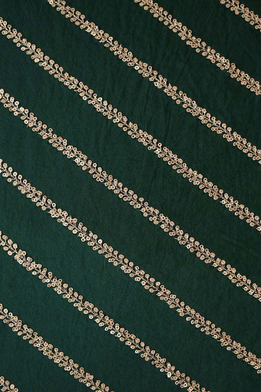 AIzaSyBcstauz-XMPRhEY21AUzeo032pxrXB5Ug - Gold Sequins With Gold Zari Stripes Embroidery Work On Bottle Green Raw Silk Fabric