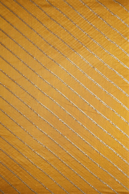 AIzaSyBcstauz-XMPRhEY21AUzeo032pxrXB5Ug - Gold Sequins With Gold Zari Stripes Embroidery Work On Mustard Yellow Raw Silk Fabric