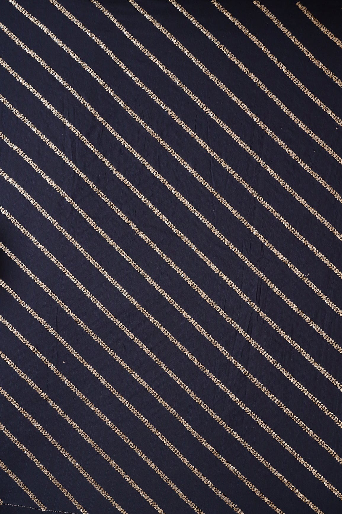 AIzaSyBcstauz-XMPRhEY21AUzeo032pxrXB5Ug - Gold Sequins With Gold Zari Stripes Embroidery Work On Navy Blue Raw Silk Fabric