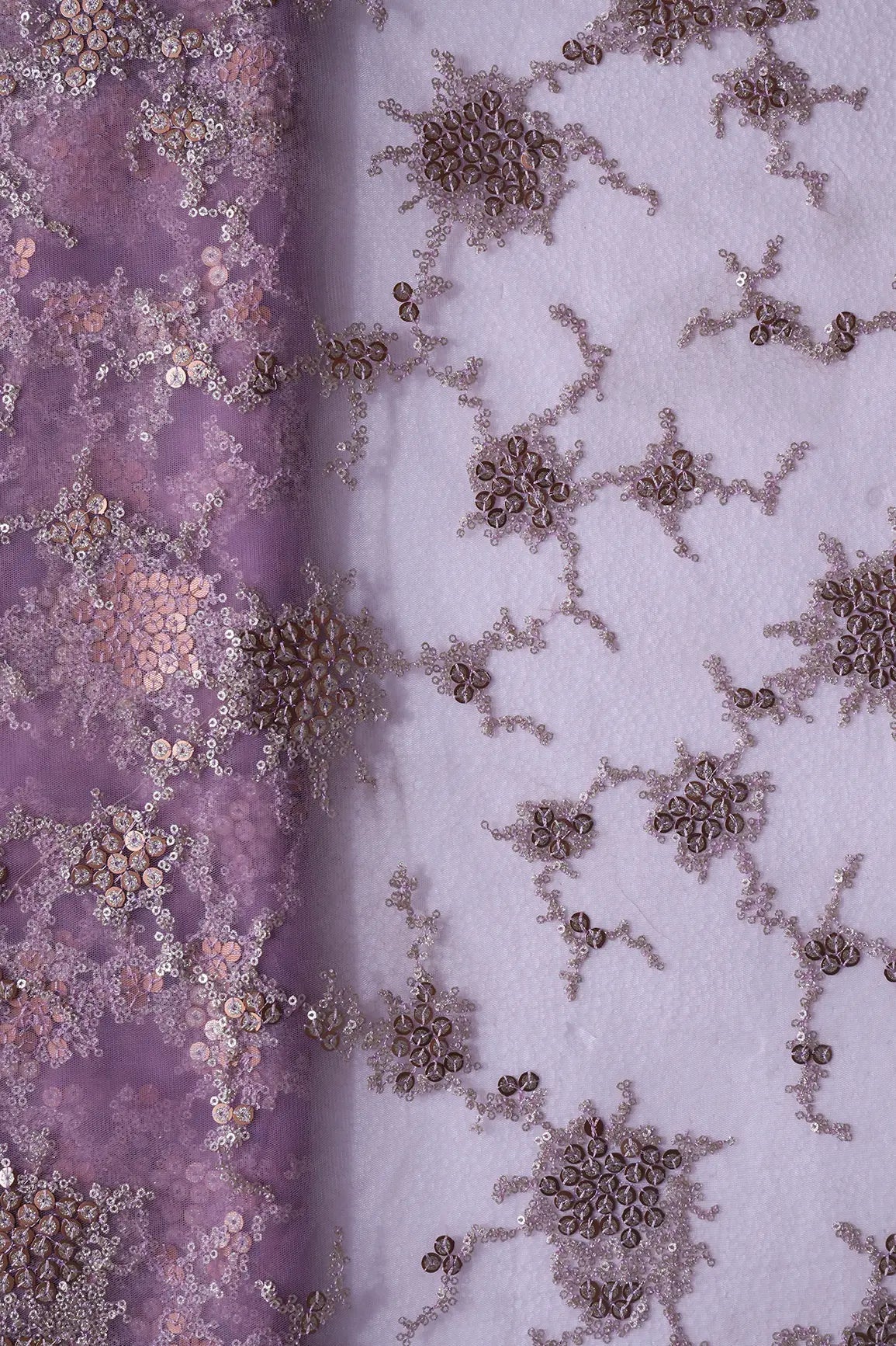 AIzaSyBcstauz-XMPRhEY21AUzeo032pxrXB5Ug - Gold Sequins With Lilac Thread Work Geometric Embroidery On Lilac Purple Soft Net Fabric