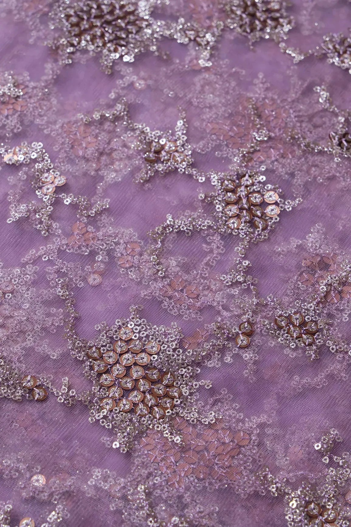 AIzaSyBcstauz-XMPRhEY21AUzeo032pxrXB5Ug - Gold Sequins With Lilac Thread Work Geometric Embroidery On Lilac Purple Soft Net Fabric