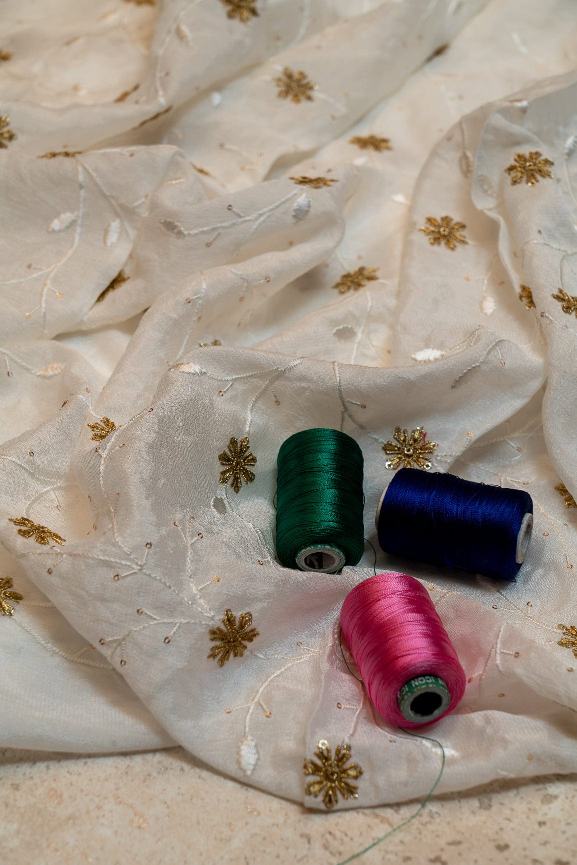 AIzaSyBcstauz-XMPRhEY21AUzeo032pxrXB5Ug - Gold Sequins With White And Gold Thread Floral Embroidery On Dyeable Natural  Crape