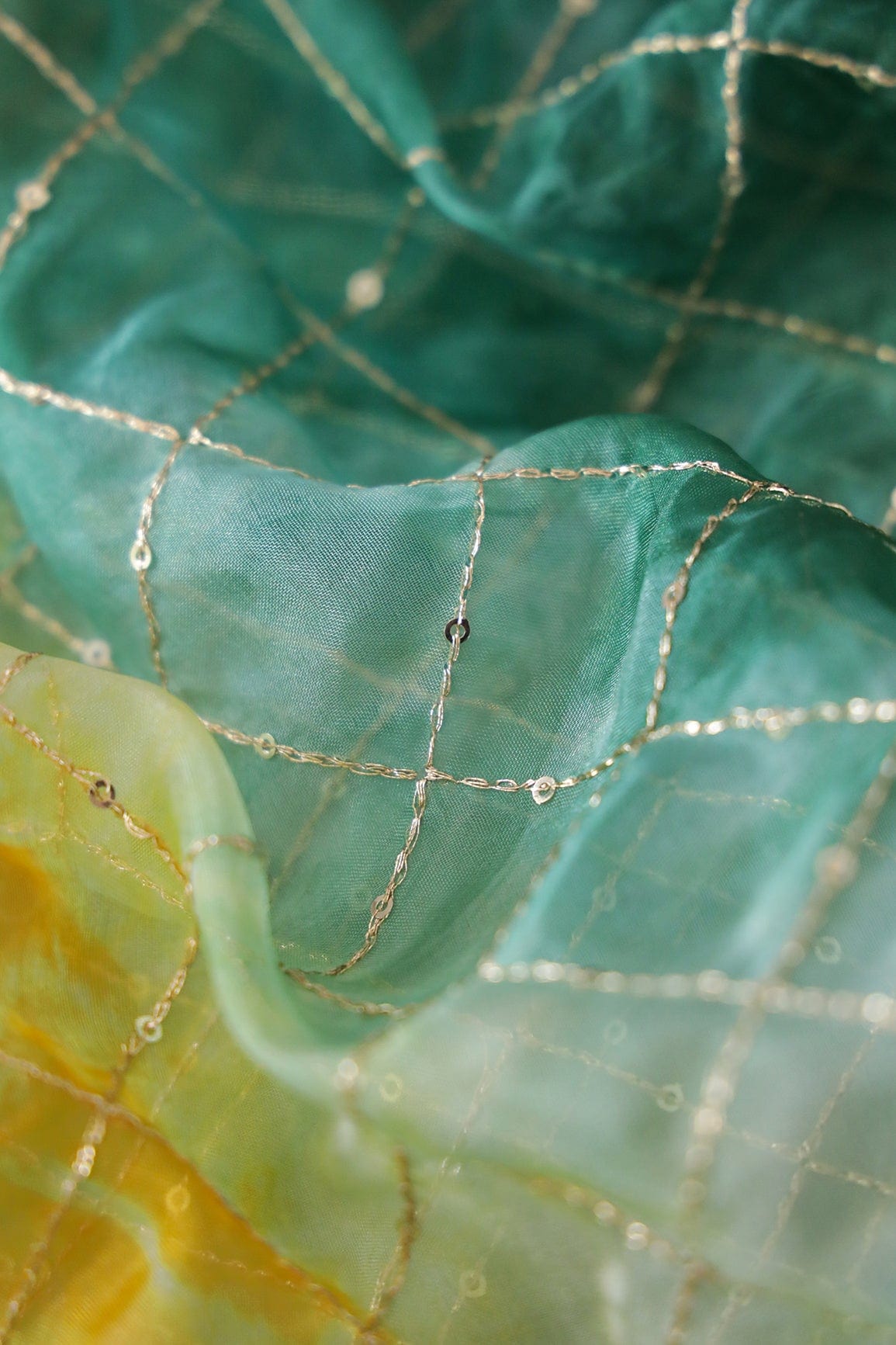 AIzaSyBcstauz-XMPRhEY21AUzeo032pxrXB5Ug - Gold Zari With Gold Sequins Checks Embroidery Work On Tie & Dye Green And Yellow Organza Fabric