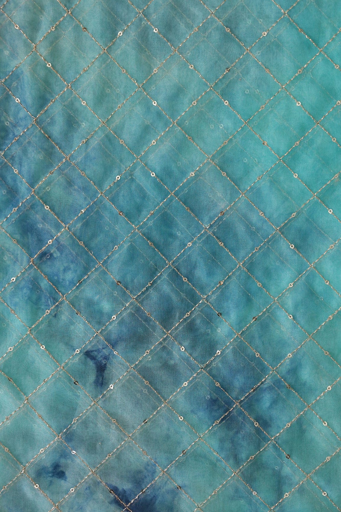 AIzaSyBcstauz-XMPRhEY21AUzeo032pxrXB5Ug - Gold Zari With Gold Sequins Checks Embroidery Work On Tie & Dye Turquoise And Blue Organza Fabric