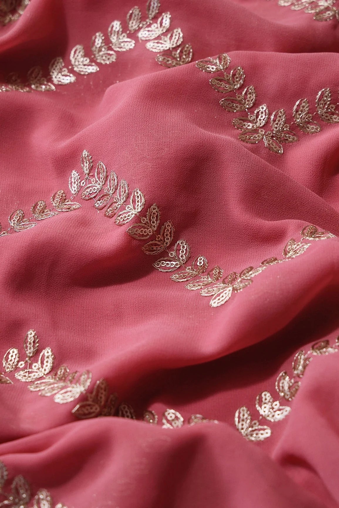AIzaSyBcstauz-XMPRhEY21AUzeo032pxrXB5Ug - Gold Zari With Gold Sequins Chevron Embroidery Work On Gajri Pink Georgette Fabric