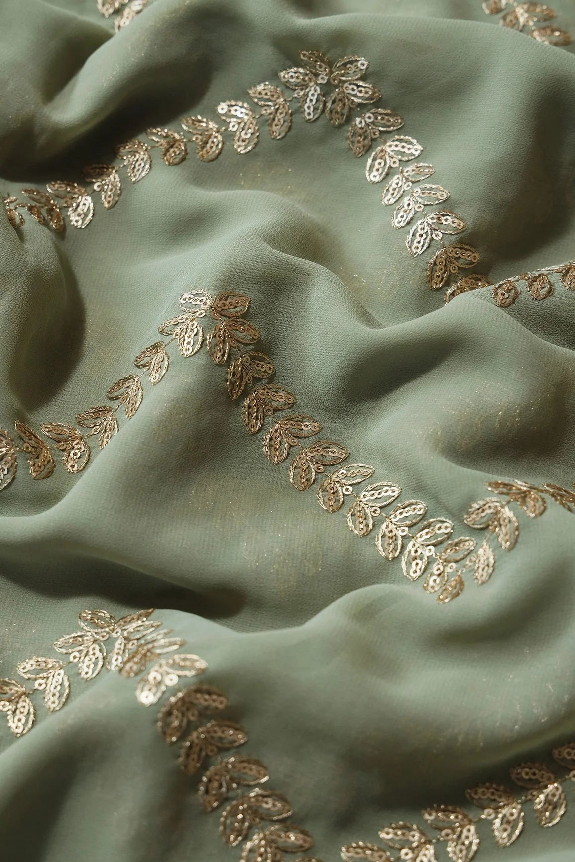 AIzaSyBcstauz-XMPRhEY21AUzeo032pxrXB5Ug - Gold Zari With Gold Sequins Chevron Embroidery Work On Olive Georgette Fabric