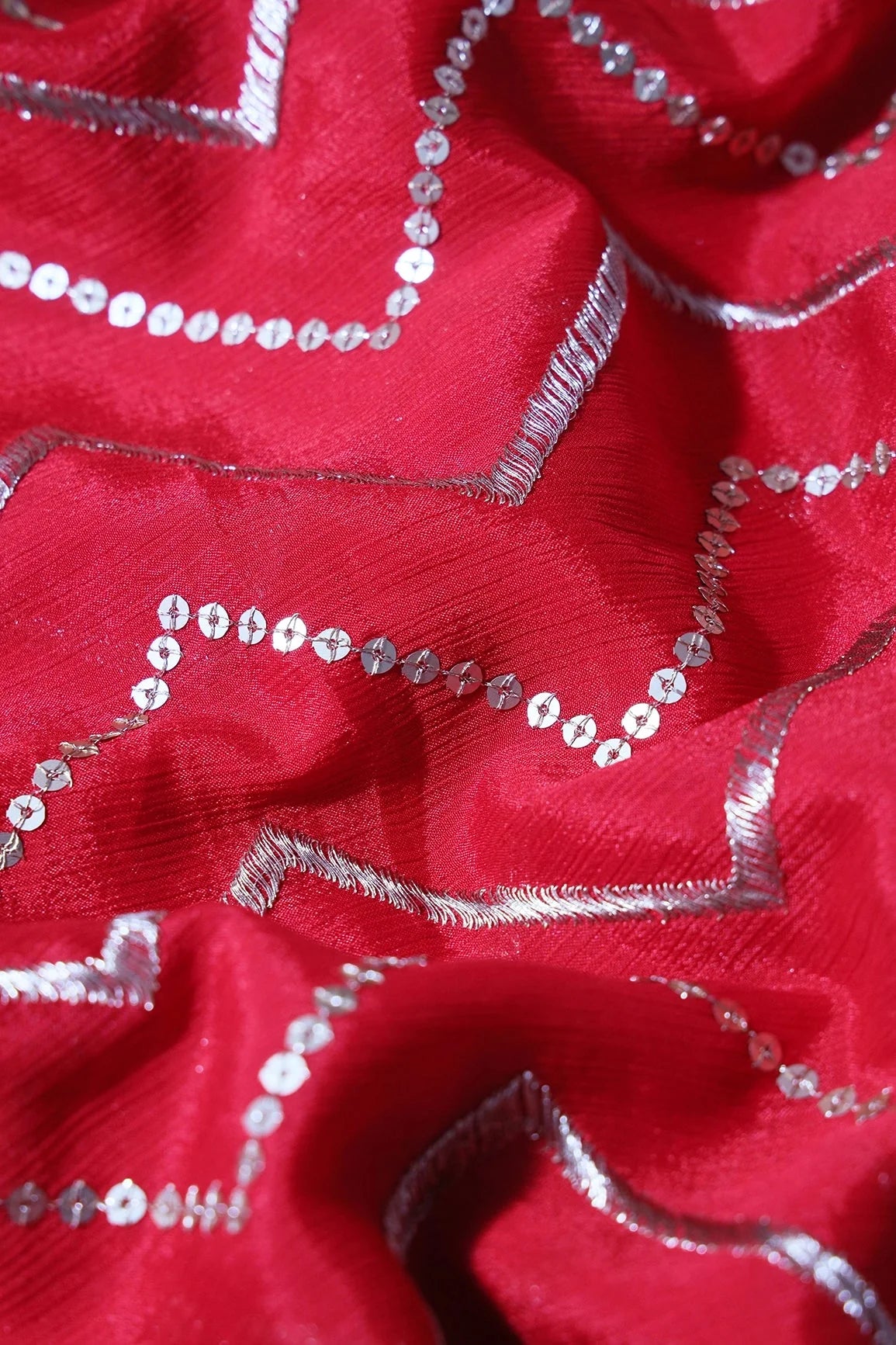 AIzaSyBcstauz-XMPRhEY21AUzeo032pxrXB5Ug - Gold Zari With Gold Sequins Chevron Embroidery Work On Red Chinnon Chiffon Fabric
