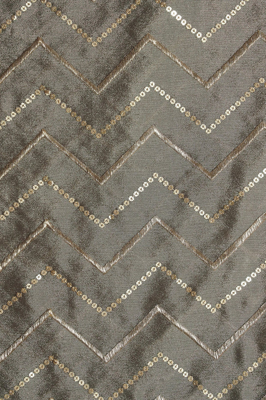 AIzaSyBcstauz-XMPRhEY21AUzeo032pxrXB5Ug - Gold Zari With Gold Sequins Chevron Embroidery Work On Stone Grey Chinnon Chiffon Fabric