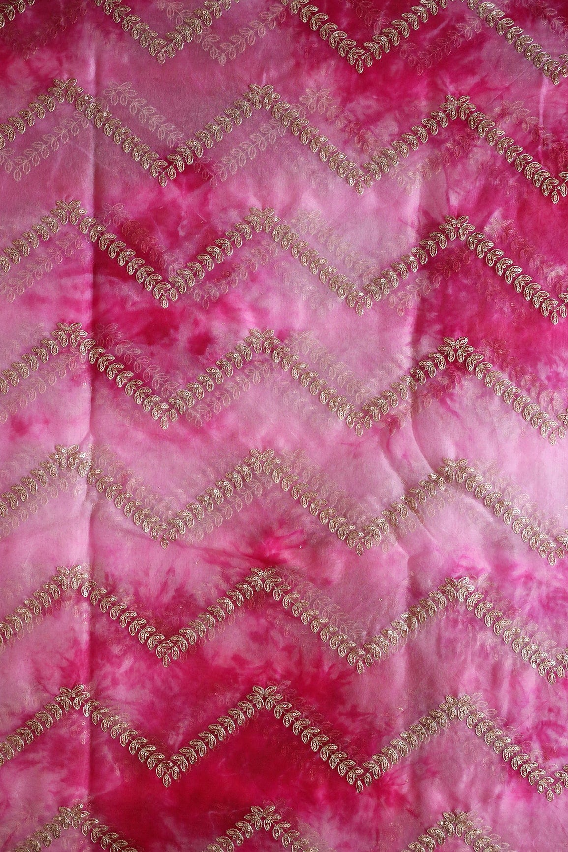 AIzaSyBcstauz-XMPRhEY21AUzeo032pxrXB5Ug - Gold Zari With Gold Sequins Chevron Embroidery Work On Tie & Dye Fuchsia Organza Fabric