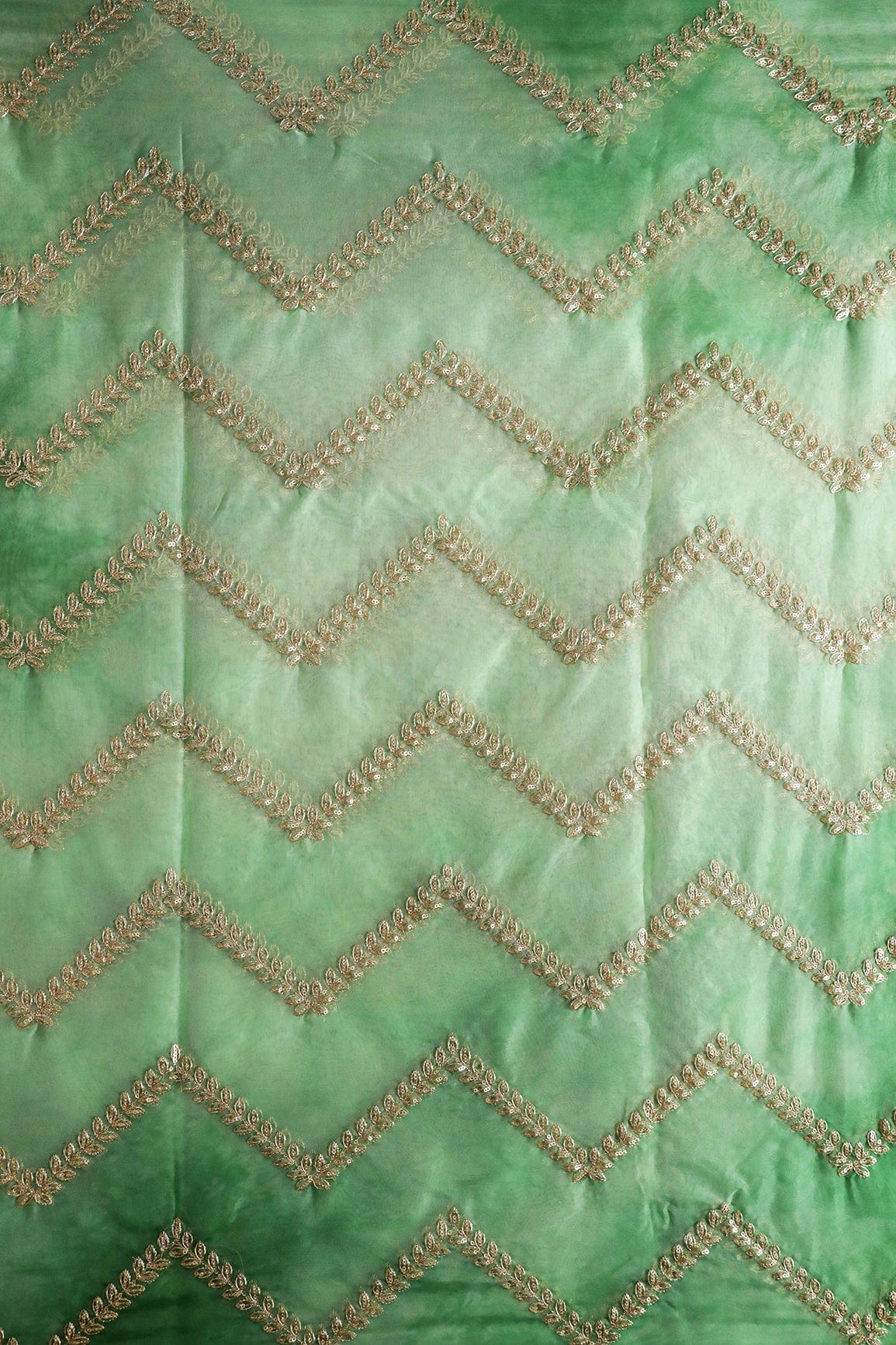 AIzaSyBcstauz-XMPRhEY21AUzeo032pxrXB5Ug - Gold Zari With Gold Sequins Chevron Embroidery Work On Tie & Dye Olive Organza Fabric