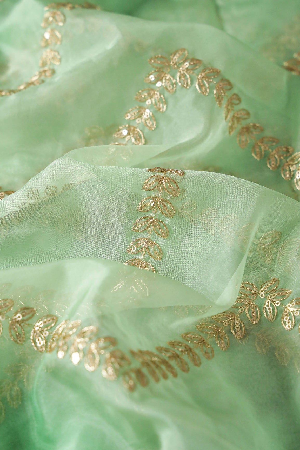 AIzaSyBcstauz-XMPRhEY21AUzeo032pxrXB5Ug - Gold Zari With Gold Sequins Chevron Embroidery Work On Tie & Dye Olive Organza Fabric