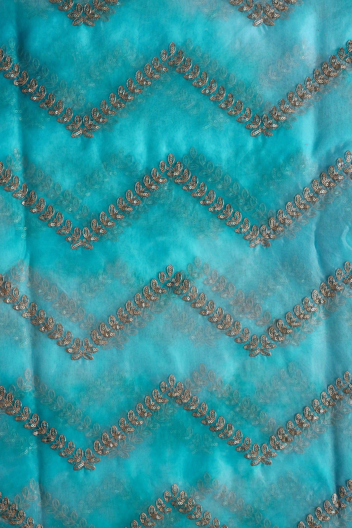 AIzaSyBcstauz-XMPRhEY21AUzeo032pxrXB5Ug - Gold Zari With Gold Sequins Chevron Embroidery Work On Tie & Dye Sky Blue Organza Fabric