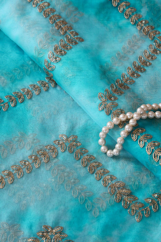 AIzaSyBcstauz-XMPRhEY21AUzeo032pxrXB5Ug - Gold Zari With Gold Sequins Chevron Embroidery Work On Tie & Dye Sky Blue Organza Fabric