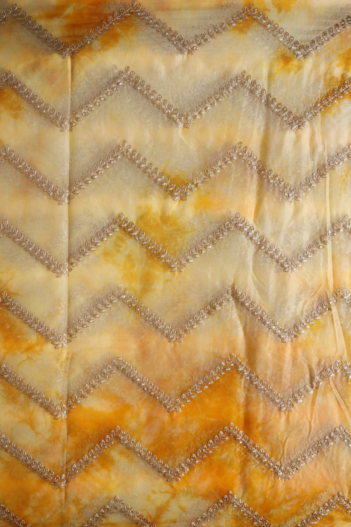 AIzaSyBcstauz-XMPRhEY21AUzeo032pxrXB5Ug - Gold Zari With Gold Sequins Chevron Embroidery Work On Tie & Dye Yellow Organza Fabric