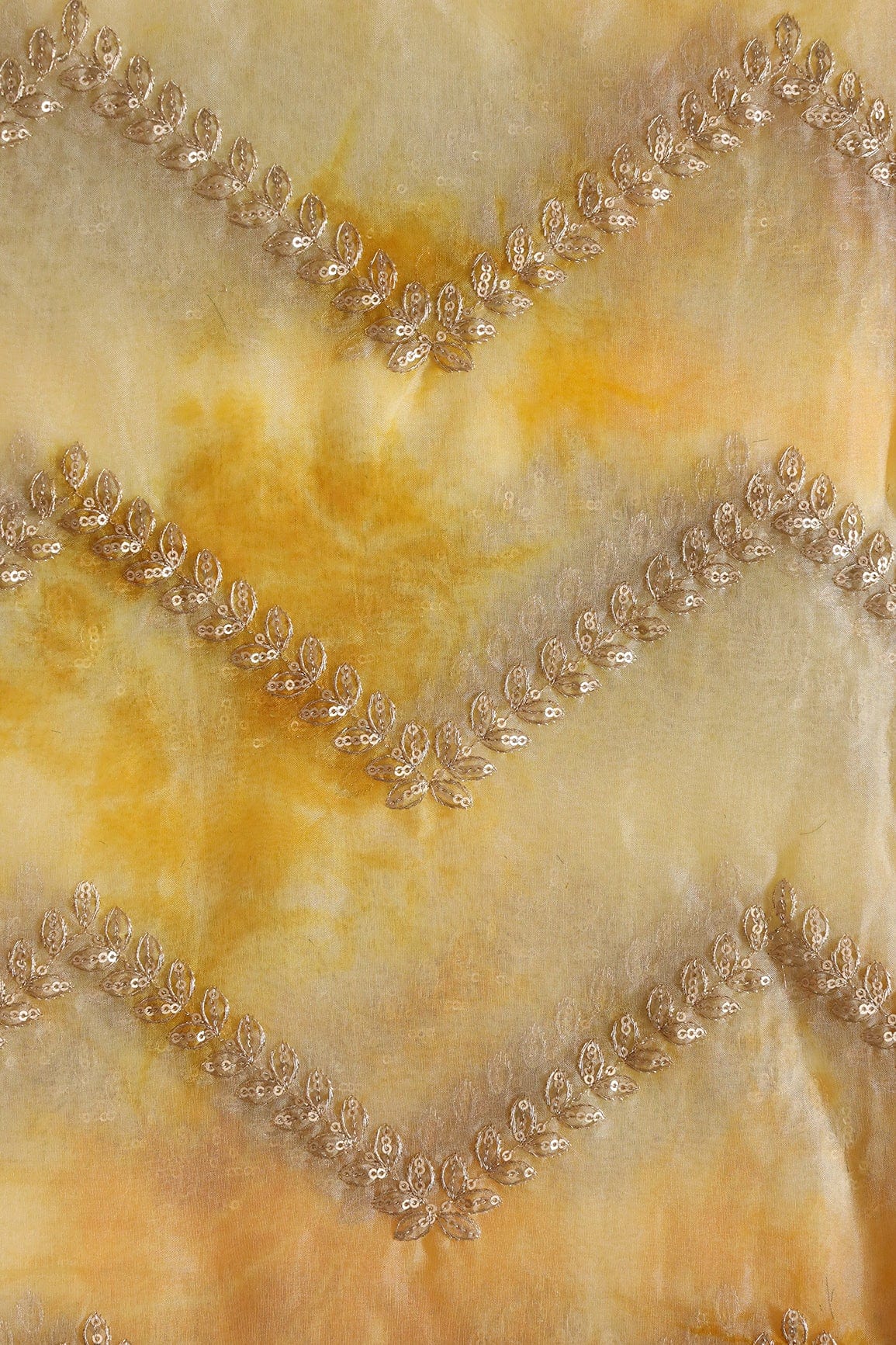 AIzaSyBcstauz-XMPRhEY21AUzeo032pxrXB5Ug - Gold Zari With Gold Sequins Chevron Embroidery Work On Tie & Dye Yellow Organza Fabric