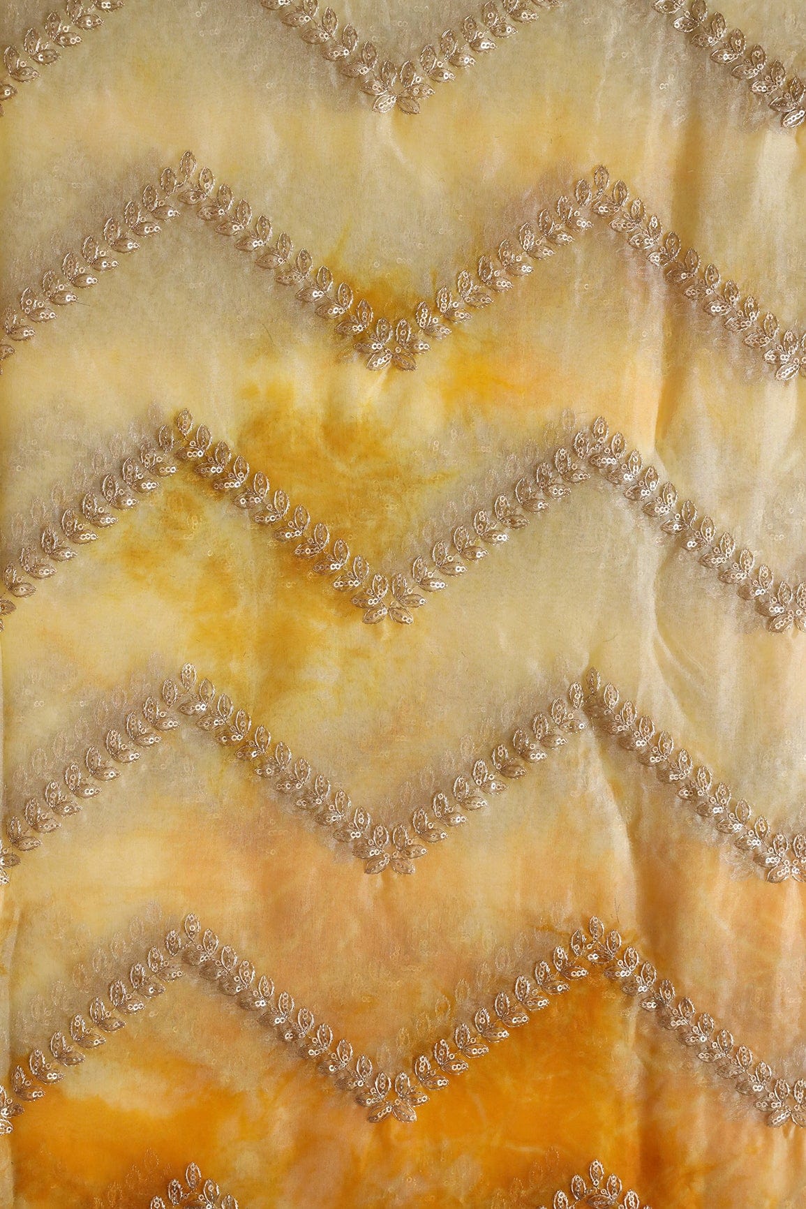 AIzaSyBcstauz-XMPRhEY21AUzeo032pxrXB5Ug - Gold Zari With Gold Sequins Chevron Embroidery Work On Tie & Dye Yellow Organza Fabric