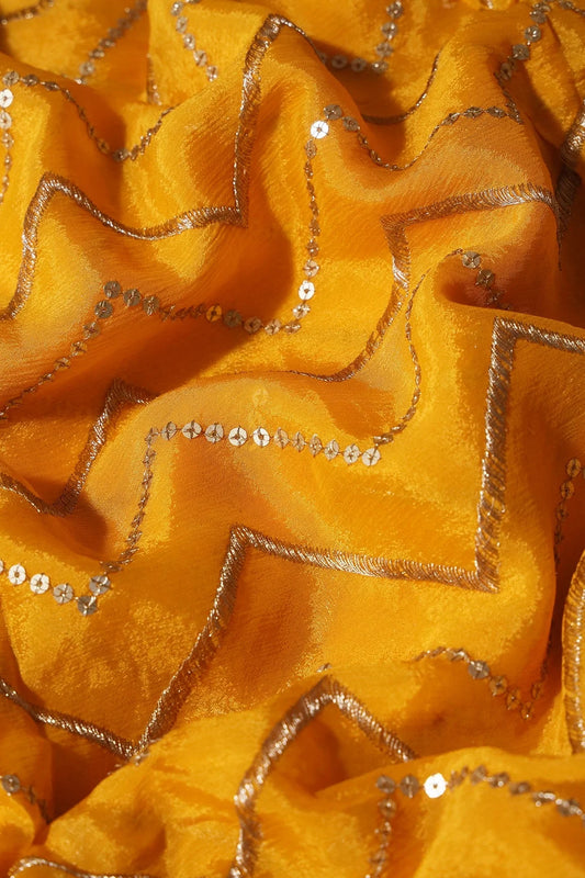 AIzaSyBcstauz-XMPRhEY21AUzeo032pxrXB5Ug - Gold Zari With Gold Sequins Chevron Embroidery Work On Yellow Chinnon Chiffon Fabric