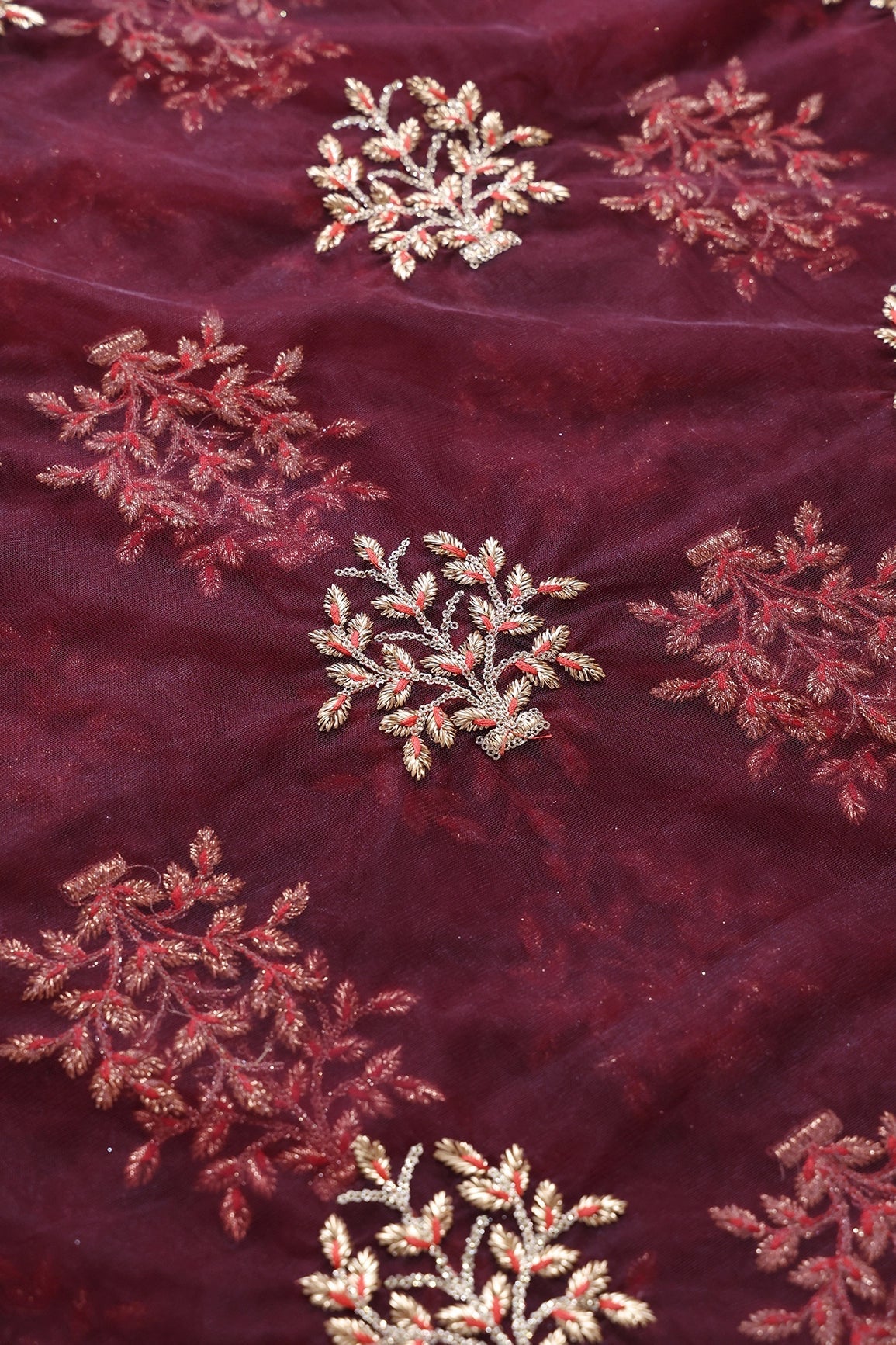 AIzaSyBcstauz-XMPRhEY21AUzeo032pxrXB5Ug - Gold Zari With Gold Sequins Floral Butta Embroidery On Maroon Soft Net Fabric