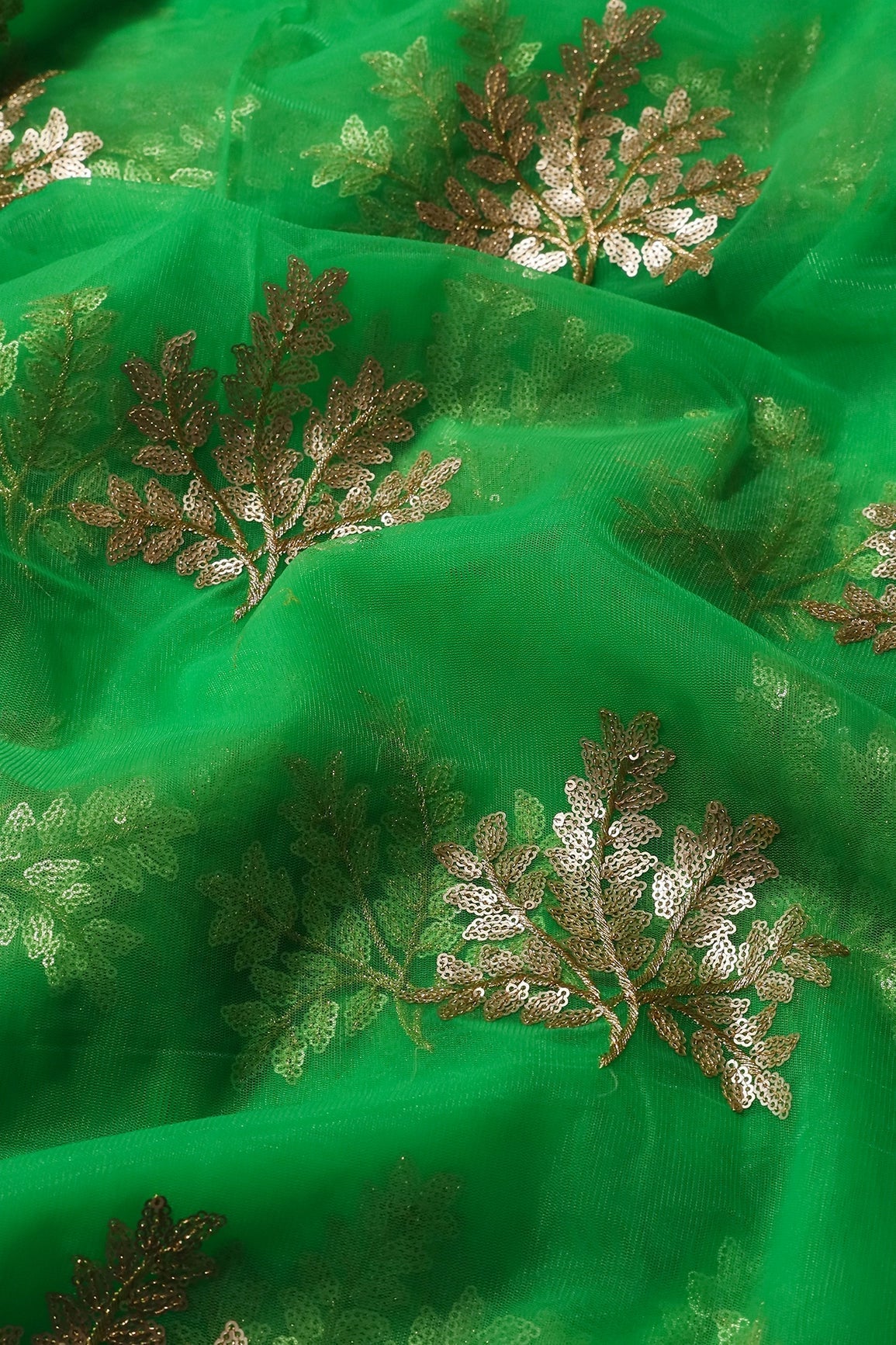 AIzaSyBcstauz-XMPRhEY21AUzeo032pxrXB5Ug - Gold Zari With Gold Sequins Leafy Embroidery Work On Dark Parrot Green Soft Net Fabric